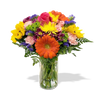 assorted joyful seasonal flowers, yellow daisy, orange Gerbera, pink carnations, sunflowers